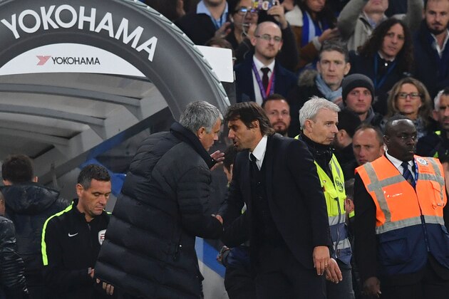Chelsea's Italian head coach Antonio Conte (R) shakes hands with Manchester United's Portuguese manager Jose Mourinho (L) after the final whistle of the English Premier League football match between Chelsea and Manchester United at Stamford Bridge in London on October 23, 2016. / AFP / BEN STANSALL / RESTRICTED TO EDITORIAL USE. No use with unauthorized audio, video, data, fixture lists, club/league logos or 'live' services. Online in-match use limited to 75 images, no video emulation. No use in betting, games or single club/league/player publications.  /         (Photo credit should read BEN STANSALL/AFP/Getty Images)