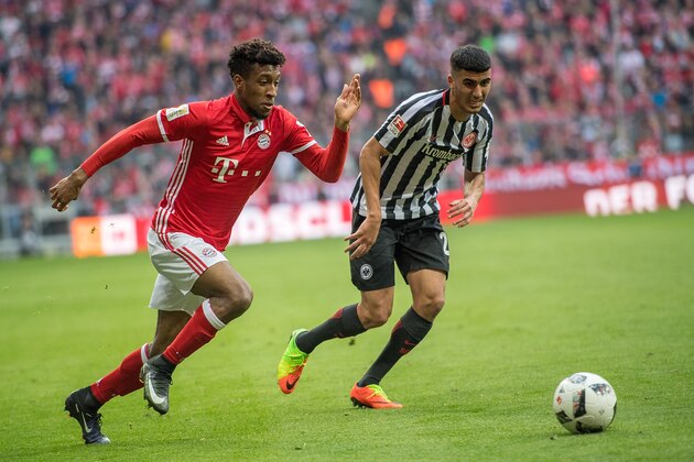 MUNICH, GERMANY - MARCH 11: Forward Kingsley Coman (29) of Bayern Muenchen and Midfielder Aymen Barkok (28) of Eintracht Frankfurt fighting for the ball during the 1. Bundesliga match between FC Bayern Muenchen and Eintracht Frankfurt at Allianz Arena on March 11, 2017 in Munich, Germany. (Photo by Oliver Kremer at Pixolli Studios/Getty Images) MUNICH, GERMANY - MARCH 11: Forward Kingsley Coman (29) of Bayern Muenchen and Midfielder Aymen Barkok (28) of Eintracht Frankfurt fighting for the ball during the 1. Bundesliga match between FC Bayern Muenchen and Eintracht Frankfurt at Allianz Arena on March 11, 2017 in Munich, Germany. (Photo by Oliver Kremer at Pixolli Studios/Getty Images)