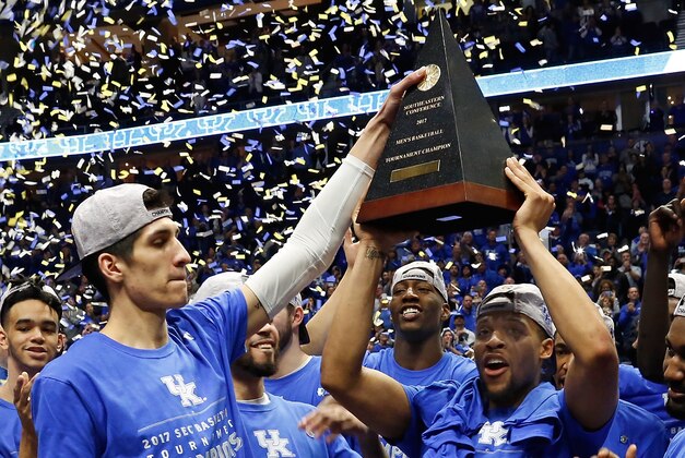 NASHVILLE, TN - MARCH 12: Derek Willis and Isaiah Briscoe hold up the the SEC Tournament Champion trophy at Bridgestone Arena on March 12, 2017 in Nashville, Tennessee. (Photo by Frederick Breedon/Getty Images) NASHVILLE, TN - MARCH 12: Derek Willis and Isaiah Briscoe hold up the the SEC Tournament Champion trophy at Bridgestone Arena on March 12, 2017 in Nashville, Tennessee. (Photo by Frederick Breedon/Getty Images)
