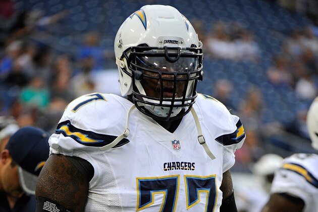 NASHVILLE, TN - AUGUST 13:  King Dunlap #77 of the San Diego Chargers warms up prior to a game against the Tennessee Titans at Nissan Stadium on August 13, 2016 in Nashville, Tennessee.  (Photo by Frederick Breedon/Getty Images)