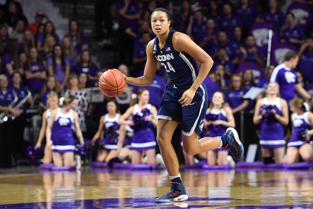 MANHATTAN, KS - DECEMBER 11:  Forward Napheesa Collier #24 of the Connecticut Huskies dribbles up court against the Kansas State Wildcats during the first half on December 11, 2016 at Bramlage Coliseum in Manhattan, Kansas.  (Photo by Peter G. Aiken/Getty Images)