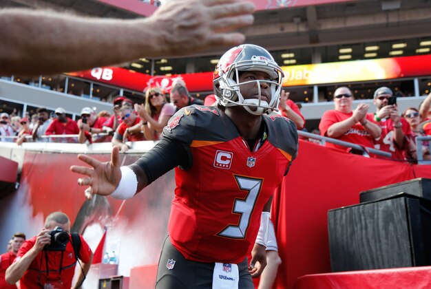 Jan 1, 2017; Tampa, FL, USA; Tampa Bay Buccaneers quarterback Jameis Winston (3) high fives fans as he runs out of the tunnel before the game against the Carolina Panthers at Raymond James Stadium. Mandatory Credit: Kim Klement-USA TODAY Sports