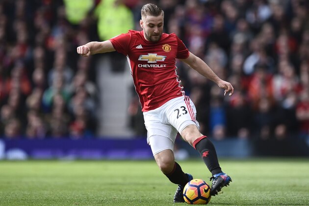 Manchester United's English defender Luke Shaw controls the ball during the English Premier League football match between Manchester United and Bournemouth at Old Trafford in Manchester, north west England, on March 4, 2017. / AFP PHOTO / Oli SCARFF / RESTRICTED TO EDITORIAL USE. No use with unauthorized audio, video, data, fixture lists, club/league logos or 'live' services. Online in-match use limited to 75 images, no video emulation. No use in betting, games or single club/league/player publications.  /         (Photo credit should read OLI SCARFF/AFP/Getty Images)