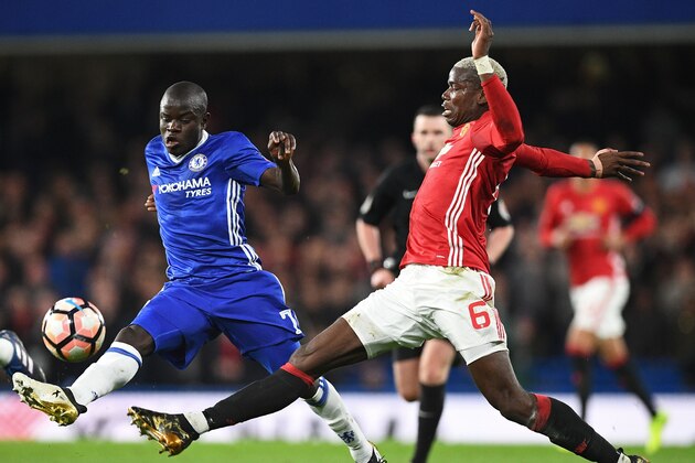 Chelsea's French midfielder N'Golo Kante (L) vies with Manchester United's French midfielder Paul Pogba during the English FA Cup quarter final football match between Chelsea and Manchester United at Stamford Bridge in London on March 13, 2017. / AFP PHOTO / Justin TALLIS / RESTRICTED TO EDITORIAL USE. No use with unauthorized audio, video, data, fixture lists, club/league logos or 'live' services. Online in-match use limited to 75 images, no video emulation. No use in betting, games or single club/league/player publications.  /         (Photo credit should read JUSTIN TALLIS/AFP/Getty Images)