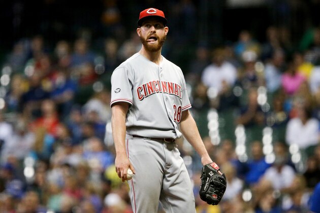 MILWAUKEE, WI - SEPTEMBER 23:  Anthony DeSclafani #28 of the Cincinnati Reds reacts after giving up a walk in the seventh inning against the Milwaukee Brewers at Miller Park on September 23, 2016 in Milwaukee, Wisconsin. (Photo by Dylan Buell/Getty Images)