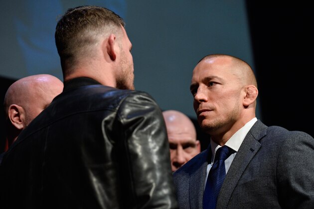LAS VEGAS, NV - MARCH 03:  (R-L) Georges St-Pierre and UFC middleweight champion Michael Bisping the UFC press conference at T-Mobile arena on March 3, 2017 in Las Vegas, Nevada. (Photo by Brandon Magnus/Zuffa LLC/Zuffa LLC via Getty Images)
