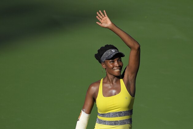 Venus Williams waves after beating Lucie Safarova, of the Czech Republic, at the BNP Paribas Open tennis tournament, Monday, March 13, 2017, in Indian Wells, Calif. (AP Photo/Mark J. Terrill)