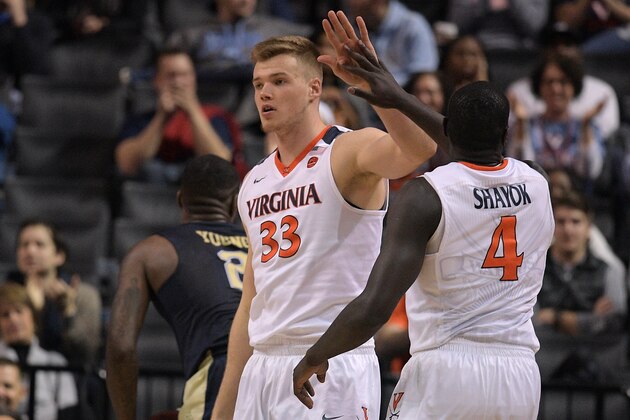 NEW YORK, NY - MARCH 08: Jack Salt #33 high-fives Marial Shayok #4 of the Virginia Cavaliers during their game against the Pittsburgh Panthers during the second round of the ACC Basketball Tournament at Barclays Center on March 8, 2017 in the Brooklyn borough of New York City. (Photo by Lance King/Getty Images)