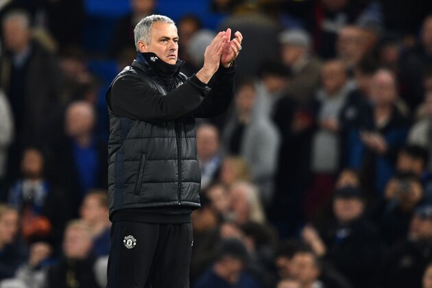 Manchester United's Portuguese manager Jose Mourinho applauds supporters on the pitch after the English FA Cup quarter final football match between Chelsea and Manchester United at Stamford Bridge in London on March 13, 2017.
Chelsea won the game 1-0. / AFP PHOTO / Glyn KIRK / RESTRICTED TO EDITORIAL USE. No use with unauthorized audio, video, data, fixture lists, club/league logos or 'live' services. Online in-match use limited to 75 images, no video emulation. No use in betting, games or single club/league/player publications.  /         (Photo credit should read GLYN KIRK/AFP/Getty Images)