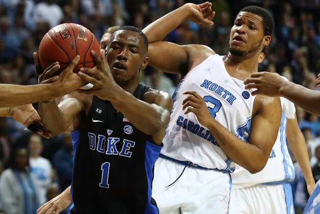 NEW YORK, NY - MARCH 10:  Harry Giles #1 of the Duke Blue Devils and Kennedy Meeks #3 of the North Carolina Tar Heels  battle for the ball  during the Semi Finals of the ACC Basketball Tournament  at the Barclays Center on March 10, 2017 in New York City.  (Photo by Al Bello/Getty Images)
