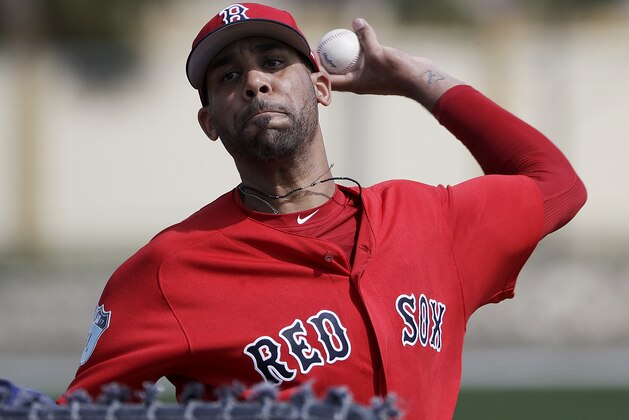 Boston Red Sox pitcher David Price throws a live batting session at a spring training baseball workout in Fort Myers, Fla., Sunday, Feb. 19, 2017. (AP Photo/David Goldman)