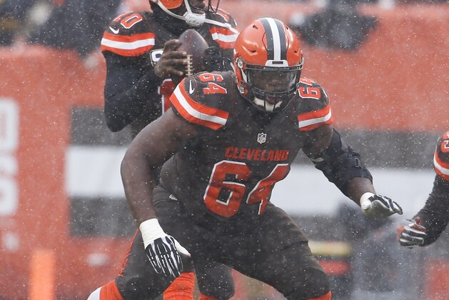 Cleveland Browns offensive guard Jonathan Cooper (64) plays against the Cincinnati Bengals in the first half of an NFL football game, Sunday, Dec. 11, 2016, in Cleveland. (AP Photo/Ron Schwane)