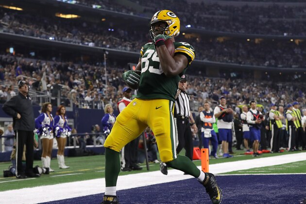 ARLINGTON, TX - JANUARY 15:  Jared Cook #89 of the Green Bay Packers celebrates after catching a touchdown pass during the third quarter against the Dallas Cowboys in the NFC Divisional Playoff game at AT&T Stadium on January 15, 2017 in Arlington, Texas.  (Photo by Ronald Martinez/Getty Images)