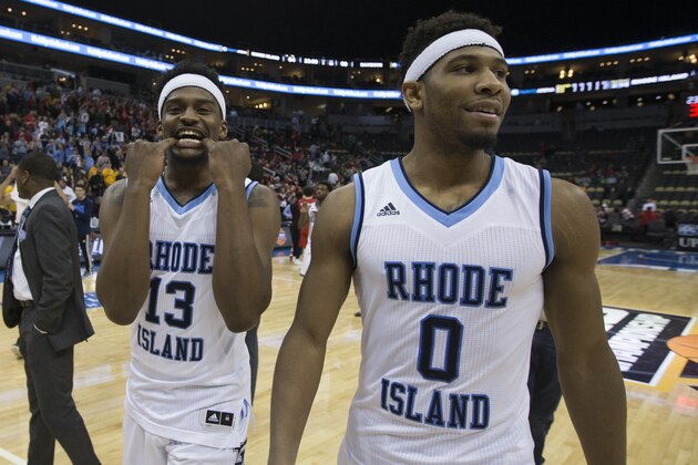PITTSBURGH, PA - MARCH 11: Stanford Robinson #13 and E.C. Matthews #0 of the Rhode Island Rams celebrate after the game against the Davidson Wildcats in the Semifinals of the men's Atlantic 10 tournament at the PPG Paints Arena on March 11, 2017 in Pittsburgh, Pennsylvania. The Rams defeated the Wildcats 84-60. (Photo by Mitchell Leff/Getty Images)
