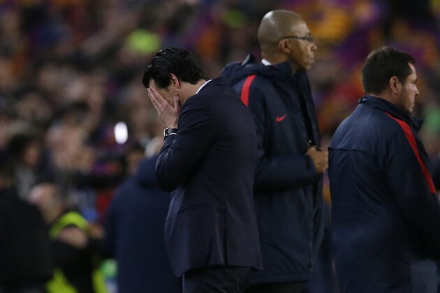 PSG head coach Unai Emery reacts at the end of the Champions League round of 16, second leg soccer match between FC Barcelona and Paris Saint Germain at the Camp Nou stadium in Barcelona, Spain, Wednesday March 8, 2017. Barcelona won the match 6-1 (6-5 on aggregate). (AP Photo/Manu Fernandez)