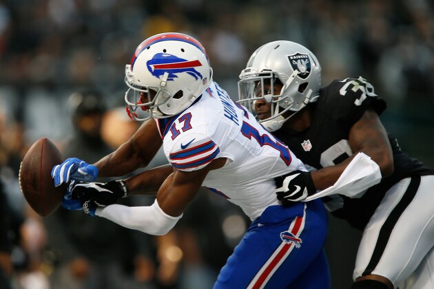 OAKLAND, CA - DECEMBER 04:  T.J. Carrie #38 of the Oakland Raiders breaks up a pass intended for Justin Hunter #17 of the Buffalo Bills during their NFL game at Oakland Alameda Coliseum on December 4, 2016 in Oakland, California.  (Photo by Brian Bahr/Getty Images)