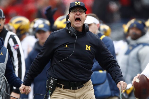 COLUMBUS, OH - NOVEMBER 26:   Head coach Jim Harbaugh of the Michigan Wolverines argues a call on the sideline during the first half against the Ohio State Buckeyes at Ohio Stadium on November 26, 2016 in Columbus, Ohio.  (Photo by Gregory Shamus/Getty Images)