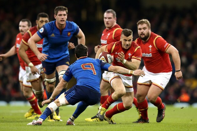 CARDIFF, WALES - FEBRUARY 26:  Gareth Davies of Wales moves past Maxime Machenaud during the RBS Six Nations match between Wales and France at the  Principality Stadium on February 26, 2016 in Cardiff, Wales.  (Photo by David Rogers/Getty Images)