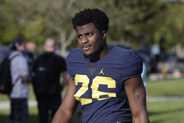 Michigan cornerback Jourdan Lewis (26) arrives for NCAA college football practice, Tuesday, Dec. 27, 2016, in Miami. Michigan plays Florida State in the Orange Bowl Friday. (AP Photo/Lynne Sladky)