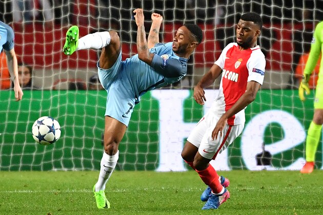 Manchester City's English midfielder Raheem Sterling (L) challenges Monaco's French midfielder Thomas Lemar during the UEFA Champions League round of 16 football match between Monaco and Manchester City at the Stade Louis II in Monaco on March 15, 2017. / AFP PHOTO / Pascal GUYOT        (Photo credit should read PASCAL GUYOT/AFP/Getty Images)
