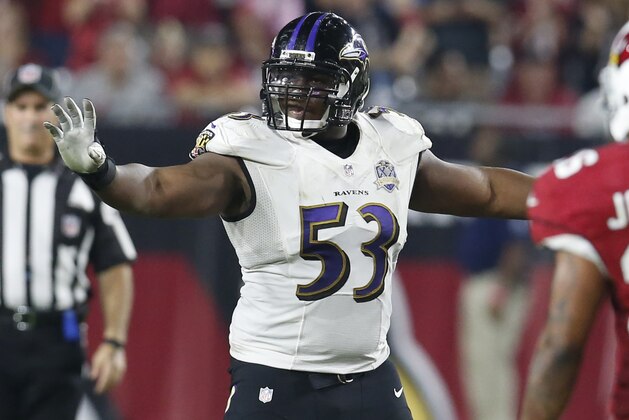 FILE - In this Oct. 26, 2015, file photo, Baltimore Ravens center Jeremy Zuttah (53) gestures during an NFL football game against the Arizona Cardinals, in Glendale, Ariz. With a 2-7 record and the playoffs out of sight, the Baltimore Ravens can either fold or put a strong finish on this brutal season.(AP Photo/Rick Scuteri, File)