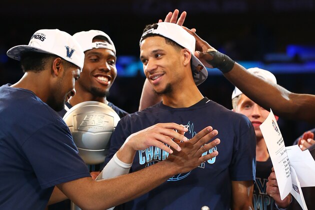 NEW YORK, NY - MARCH 11:  Josh Hart #3, Kris Jenkins #2 and Darryl Reynolds #45 of the Villanova Wildcats celebrate after defeating the Creighton Bluejays to win the Big East Basketball Tournament - Championship Game at Madison Square Garden on March 11, 2017 in New York City.  (Photo by Mike Stobe/Getty Images)