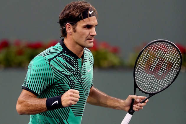 INDIAN WELLS, CA - MARCH 14:  Roger Federer of Switzerland celebrates match point against Steve Johnson during the BNP Paribas Open at the Indian Wells Tennis Garden on March 14, 2017 in Indian Wells, California.  (Photo by Matthew Stockman/Getty Images)