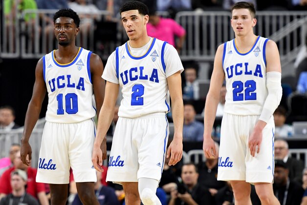LAS VEGAS, NV - MARCH 09:  Isaac Hamilton #10, Lonzo Ball #2 and TJ Leaf #22 of the UCLA Bruins stand on the court during a quarterfinal game of the Pac-12 Basketball Tournament against the USC Trojans at T-Mobile Arena on March 9, 2017 in Las Vegas, Nevada. UCLA won 76-74.  (Photo by Ethan Miller/Getty Images)