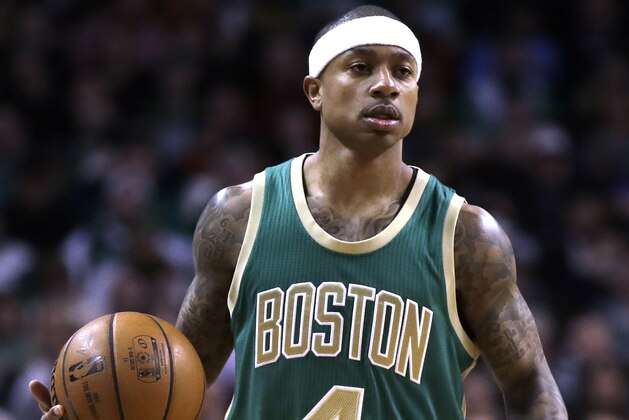 Boston Celtics guard Isaiah Thomas (4) dribbles the ball during the second quarter of an NBA game in Boston, Wednesday, March 15, 2017. (AP Photo/Charles Krupa)