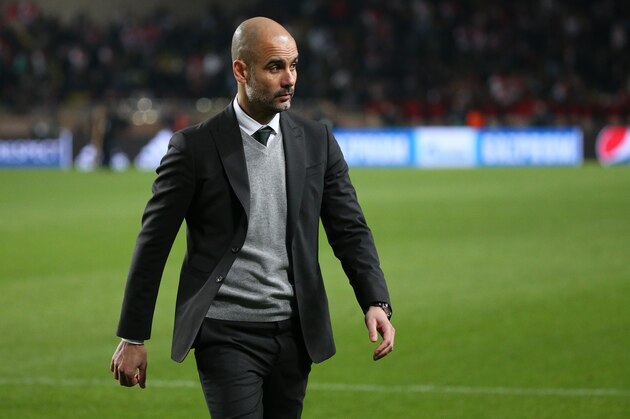 MONACO, MONACO - MARCH 15: Coach of Manchester City Pep Guardiola looks dejected following the UEFA Champions League Round of 16 second leg match between AS Monaco (ASM) and Manchester City FC at Stade Louis II on March 15, 2017 in Monaco, Monaco. (Photo by Jean Catuffe/Getty Images)