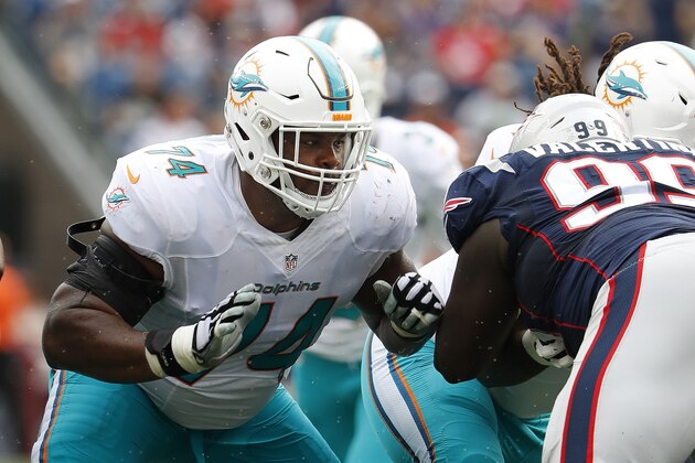 Miami Dolphins offensive guard Jermon Bushrod blocks against the New England Patriots during a NFL football game at Gillette Stadium in Foxborough, Mass. Sunday, Sept. 18, 2016. (Winslow Townson/AP Images for Panini)