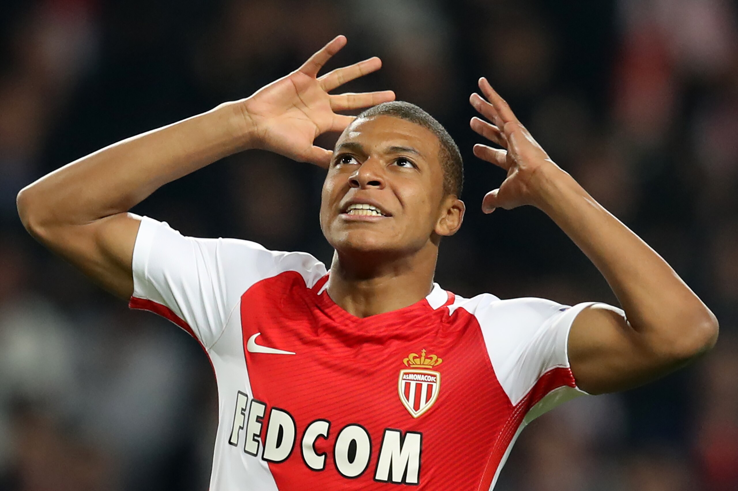 Monaco's French forward Kylian Mbappe Lottin reacts after missing a goal opportunity during the UEFA Champions League round of 16 football match between Monaco and Manchester City at the Stade Louis II in Monaco on March 15, 2017. / AFP PHOTO / Valery HACHE        (Photo credit should read VALERY HACHE/AFP/Getty Images)