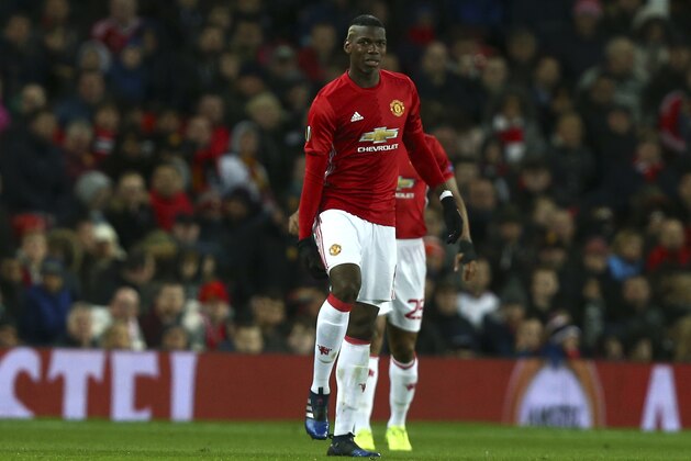 United's Paul Pogba leaves the field limping after getting injured during the Europa League round of 16, second leg, soccer match between Manchester United and FC Rostov at Old Trafford Stadium in Manchester, England, Thursday March 16, 2017. (AP Photo/Dave Thompson)