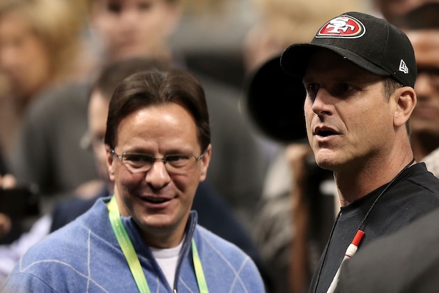 NEW ORLEANS, LA - FEBRUARY 03:  Head coach Jim Harbaugh (R) of the San Francisco 49ers and his brother in-law Indiana Hoosiers head basketball coach Tom Crean talk on the field prior to Super Bowl XLVII against the Baltimore Ravens  at the Mercedes-Benz Superdome on February 3, 2013 in New Orleans, Louisiana.  (Photo by Win McNamee/Getty Images)