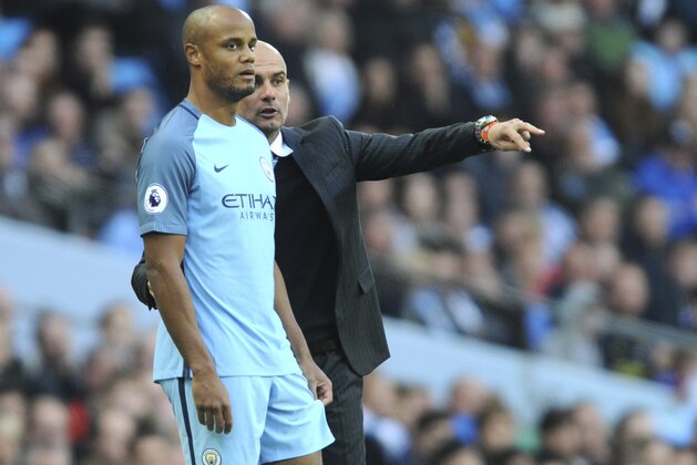 Manchester City manager Josep Guardiola, right, brings Manchester City's Vincent Kompany as a substitute during the English Premier League soccer match between Manchester City and Everton at the Etihad Stadium in Manchester, England, Saturday, Oct. 15, 2016. (AP Photo/Rui Vieira) Manchester City manager Josep Guardiola, right, brings Manchester City's Vincent Kompany as a substitute during the English Premier League soccer match between Manchester City and Everton at the Etihad Stadium in Manchester, England, Saturday, Oct. 15, 2016. (AP Photo/Rui Vieira)