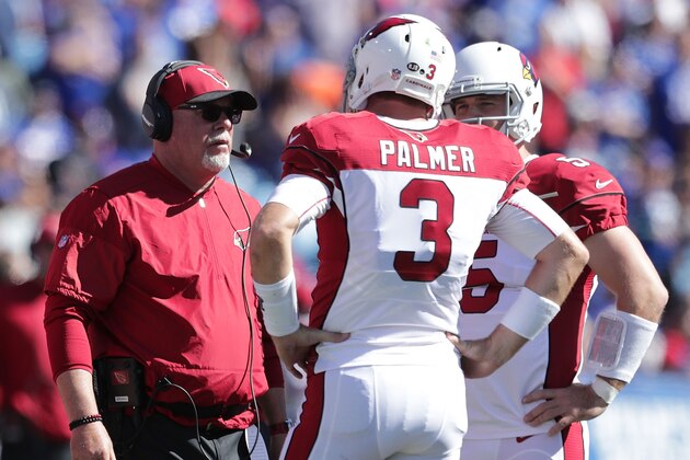 ORCHARD PARK, NY - SEPTEMBER 25:  Head Coach Bruce Arians of the Arizona Cardinals talks with  Carson Palmer #3 of the Arizona Cardinals during the first half against the Buffalo Bills at New Era Field on September 25, 2016 in Orchard Park, New York.  (Photo by Brett Carlsen/Getty Images)