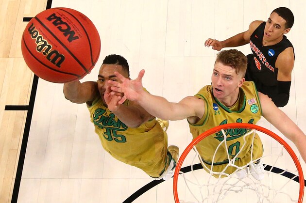 BUFFALO, NY - MARCH 16:  Bonzie Colson #35 and Rex Pflueger #0 of the Notre Dame Fighting Irish look for the rebound against the Princeton Tigers during the first round of the 2017 NCAA Men's Basketball Tournament at KeyBank Center on March 16, 2017 in Buffalo, New York.  (Photo by Maddie Meyer/Getty Images)
