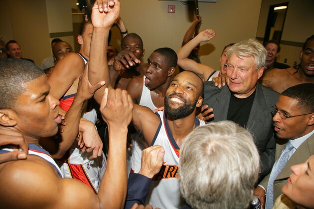 OAKLAND, CA - MAY 3: Baron Davis #5 of the Golden State Warriors celebrates with his team after the victory against the Dallas Mavericks in Game Six of the 2007 NBA Playoffs on May 3, 2007 at Oracle Arena in Oakland, California. NOTE TO USER: User expressly acknowledges and agrees that, by downloading and or using this photograph, user is consenting to the terms and conditions of Getty Images License Agreement. Mandatory Copyright Notice: Copyright 2007 NBAE (Photo by Rocky Widner/NBAE via Getty Images)