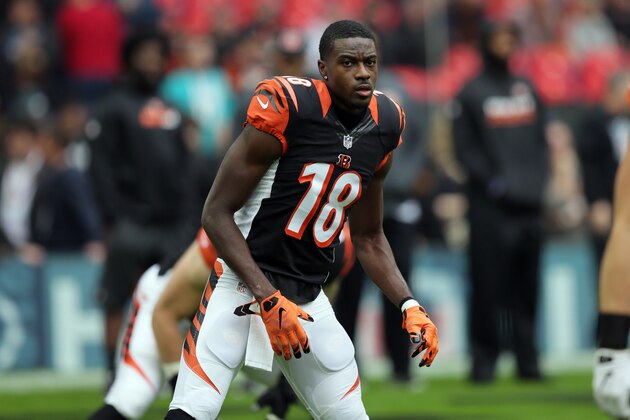 Cincinnati Bengals wide receiver A.J. Green (18) warms up before an NFL Football game between Cincinnati Bengals and Washington Redskins at Wembley Stadium in London, Sunday Oct. 30, 2016. (AP Photo/Tim Ireland)