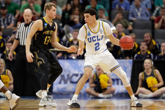 SACRAMENTO, CA - MARCH 17: Lonzo Ball #2 of the UCLA Bruins is defended by Mitch Peterson #13 of the Kent State Golden Flashes during the first round of the 2017 NCAA Men's Basketball Tournament at Golden 1 Center on March 17, 2017 in Sacramento, California.  (Photo by Jamie Squire/Getty Images)