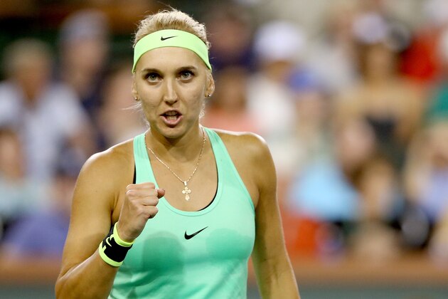 INDIAN WELLS, CA - MARCH 17:  Elena Vesnina of Russia celebrates a point against Kristina Mladenovic of France during the semifinals of the BNP Paribas Open at the Indian Wells Tennis Garden on March 17, 2017 in Indian Wells, California.  (Photo by Matthew Stockman/Getty Images)