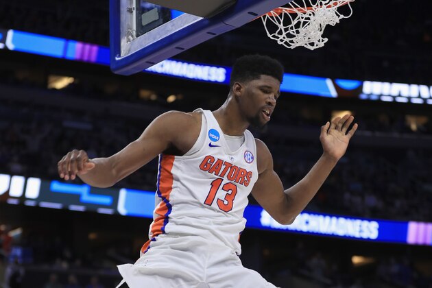 ORLANDO, FL - MARCH 16:  Kevarrius Hayes #13 of the Florida Gators dunks the ball against the East Tennessee State Buccaneers during the first round of the 2017 NCAA Men's Basketball Tournament at Amway Center on March 16, 2017 in Orlando, Florida.  (Photo by Mike Ehrmann/Getty Images)
