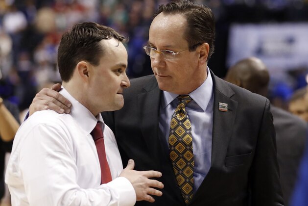 Dayton head coach Archie Miller, left, and Wichita State head coach Gregg Marshall talk following a first-round game in the men's NCAA college basketball tournament Friday, March 17, 2017, in Indianapolis. Wichita State won 64-58. (AP Photo/Jeff Roberson) Dayton head coach Archie Miller, left, and Wichita State head coach Gregg Marshall talk following a first-round game in the men's NCAA college basketball tournament Friday, March 17, 2017, in Indianapolis. Wichita State won 64-58. (AP Photo/Jeff Roberson)