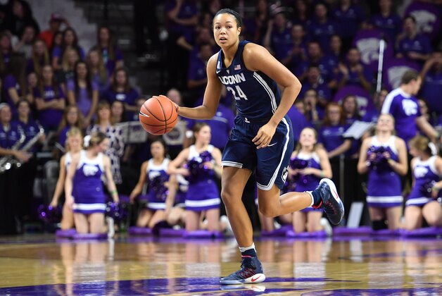 MANHATTAN, KS - DECEMBER 11:  Forward Napheesa Collier #24 of the Connecticut Huskies dribbles up court against the Kansas State Wildcats during the first half on December 11, 2016 at Bramlage Coliseum in Manhattan, Kansas.  (Photo by Peter G. Aiken/Getty Images)