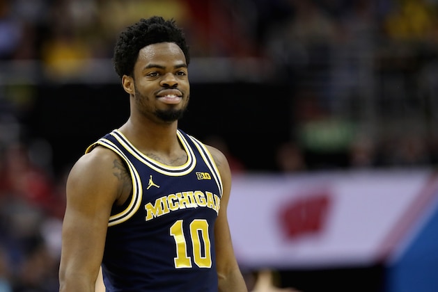 WASHINGTON, DC - MARCH 12:  Derrick Walton Jr. #10 of the Michigan Wolverines runs up the floor after scoring against the Wisconsin Badgers during the Big Ten Basketball Tournament Championship game at Verizon Center on March 12, 2017 in Washington, DC.  (Photo by Rob Carr/Getty Images)