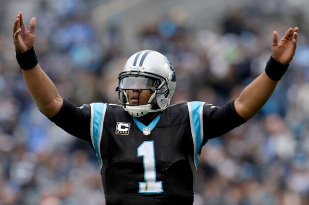 CHARLOTTE, NC - DECEMBER 11:  Cam Newton #1 of the Carolina Panthers salutes the crowd against the San Diego Chargers during their game at Bank of America Stadium on December 11, 2016 in Charlotte, North Carolina.  (Photo by Streeter Lecka/Getty Images)