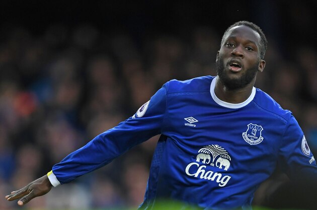Everton's Belgian striker Romelu Lukaku celebrates after scoring their third goal during the English Premier League football match between Everton and Hull City at Goodison Park in Liverpool, north west England on March 18, 2017. / AFP PHOTO / Paul ELLIS / RESTRICTED TO EDITORIAL USE. No use with unauthorized audio, video, data, fixture lists, club/league logos or 'live' services. Online in-match use limited to 75 images, no video emulation. No use in betting, games or single club/league/player publications.  /         (Photo credit should read PAUL ELLIS/AFP/Getty Images)