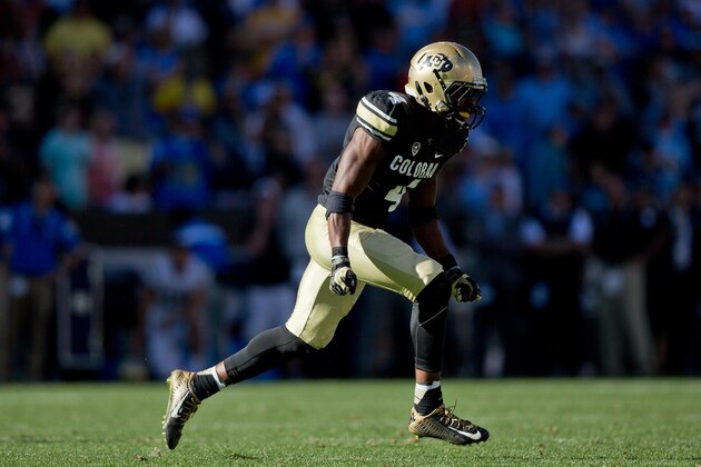 BOULDER, CO - OCTOBER 25:  Defensive back Chidobe Awuzie #4 of the Colorado Buffaloes reacts after stopping the UCLA Bruins on fourth down during the fourth quarter at Folsom Field on October 25, 2014 in Boulder, Colorado. The Bruins defeated the Buffaloes 40-37 in double overtime. (Photo by Justin Edmonds/Getty Images)