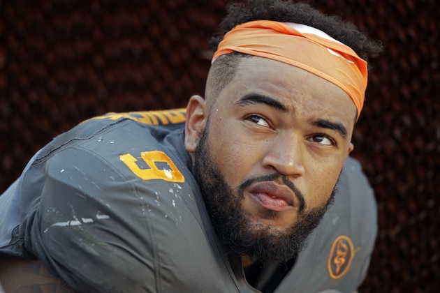 FILE - In this Sept. 24, 2016, file photo, Tennessee defensive end Derek Barnett (9) watches from the sideline during the second half of an NCAA college football game against Florida, in Knoxville, Tenn. Barnett returns to his hometown with a chance to pass Reggie White for the school's career sacks record when the 24th-ranked Volunteers visit Vanderbilt.  (AP Photo/Wade Payne, File)