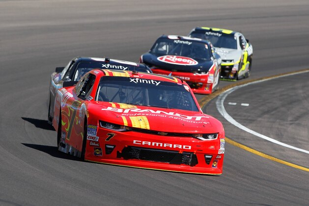 AVONDALE, AZ - MARCH 18:  Justin Allgaier, driver of the #7 BRANDT Chevrolet, leads a pack of cars during the NASCAR XFINITY Series DC Solar 200 at Phoenix International Raceway on March 18, 2017 in Avondale, Arizona.  (Photo by Brian Lawdermilk/Getty Images)